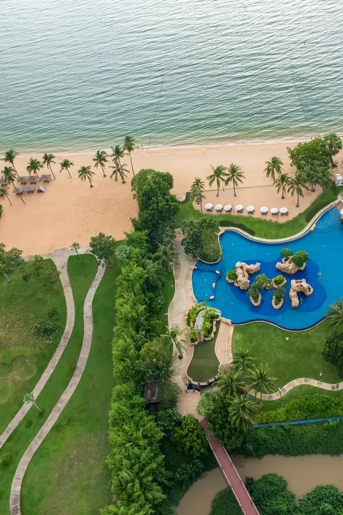 Aerial view of a beach resort and swimming pools in Chon Buri, Thailand
