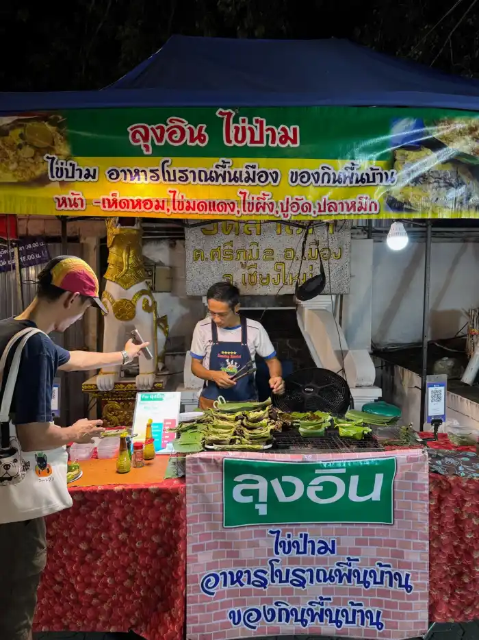 Savouring the vibrant nightlife of Thailand's floating markets. Freshly made cuisine under the stars, where every corner tells a story