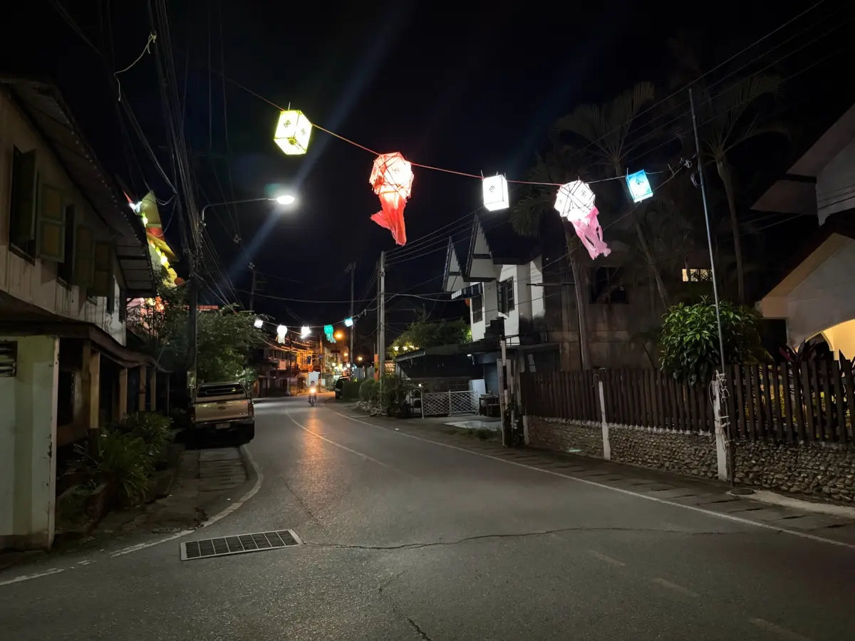 Navigating the vibrant streets under lantern light, immersing in the culture of this place